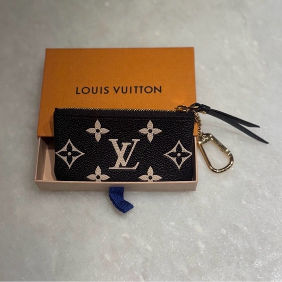Authentic Louis Vuitton Key Pouch Cles Bicolor Empreinte Monogram Leather - Picture 5 of 10
